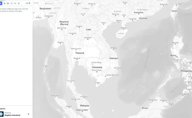 A monochrome terrain map highlights elevation changes and coastal outlines across Southeast Asia using a desaturated basemap style.